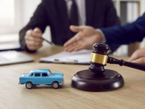 Judge Gavel And Car Symbolize Auction Or Of Legal Dispute For Receiving Automobile Insurance