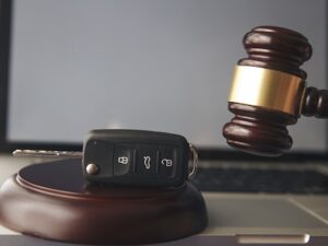 Car Auction Concept Gavel And Car Key On The Wooden Desk